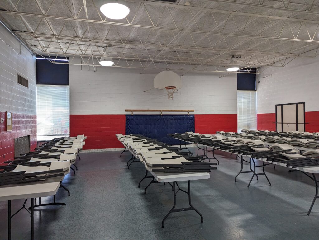 gymnasium with tables set up